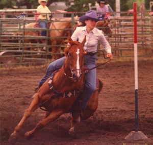 Pole Bending on Reed Man at the Kansas State High School Rodeo. Photo courtesy Blomquist Photo